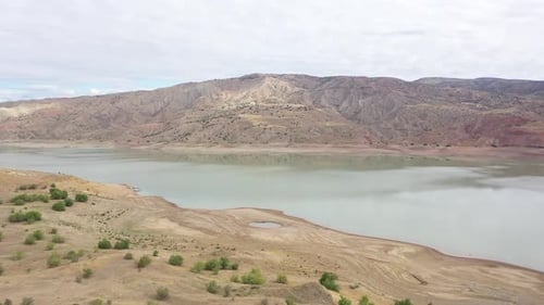Aerial View Of Dam Lake And Mountain