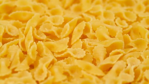 Close Up of Yellow Dry Farfalle Pasta