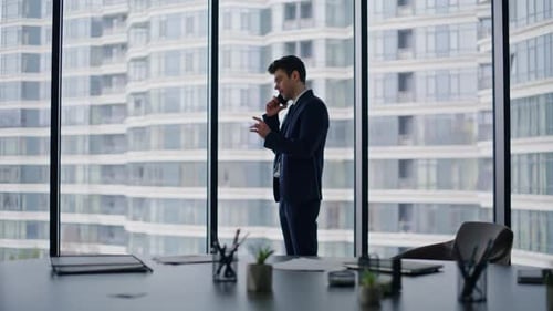 Corporate Worker Speaking Smartphone in Luxury Office Closeup Confident Man