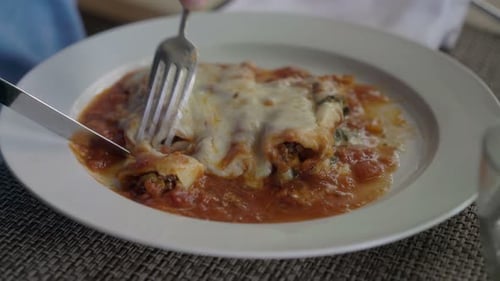 Man Eating Meal Sitting in Cafe 30s