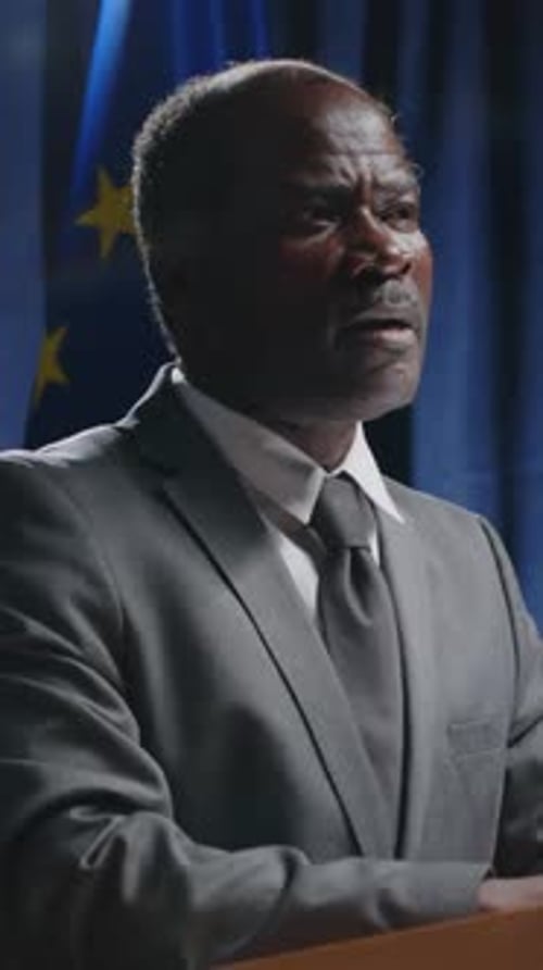 Adult Man Giving Speech at Podium