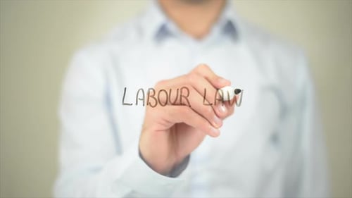 Labor Law, Man Writing on Transparent Screen