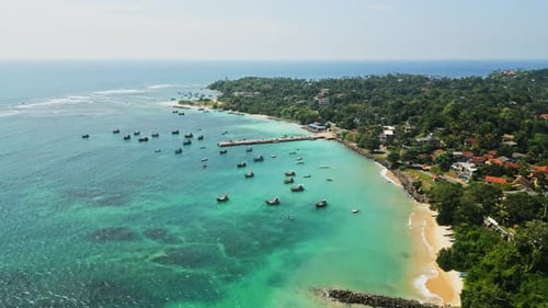 Aerial View Over Tropical Lagoon Azure Waters with Boats Coast Villages for Travel Fishing Leisure