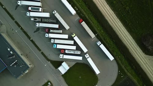 Semi Trucks Parked at a Depot Aerial View