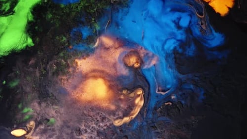 view of colorful liquids blending in mesmerizing abstract fluid motion