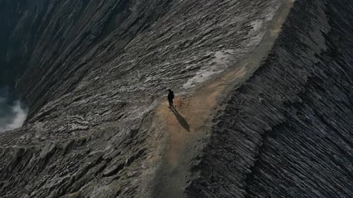 A Man at the Foot of the Bromo Volcano Looks Down