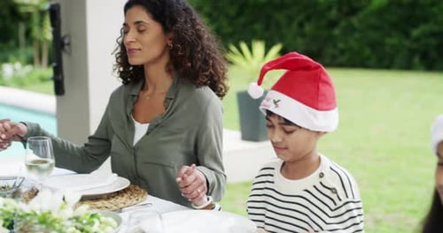 Family Gathering Together for Christmas Meal