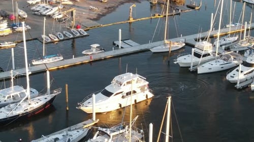 Aerial View Of Luxury Yacht Arrived And Parked At Marina.
