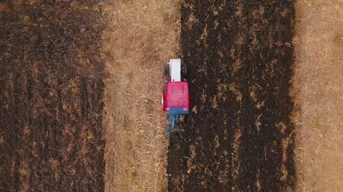 Farm Tractor Plowing Field 4k