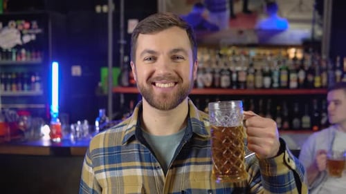Portrait of a Man with Beer in a Pub