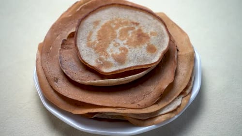 Stack of Pancakes on White Plate, Close-Up
