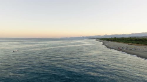 Calm Ocean Waves on Sandy Beach