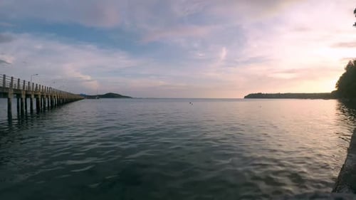 Time Lapse of the Sunset Over the Sea with Pink and Blue Sky.