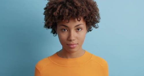 Close Up of Woman Smiling in Studio Setting