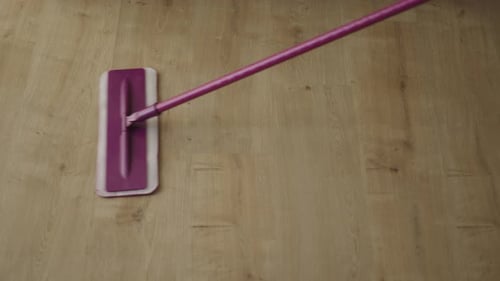 Mop Cleaning a Wooden Floor