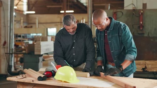 Woodworkers Collaborate on Project in Workshop