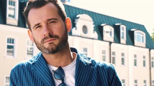 Handsome Man Posing Outdoors in Urban Setting