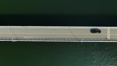Small bridge on the green river.