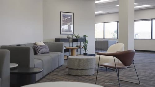 Modern Lounge Area in Office with Stylish Furniture and Decor
