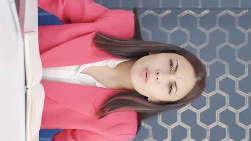 Woman Giving a Presentation at Work