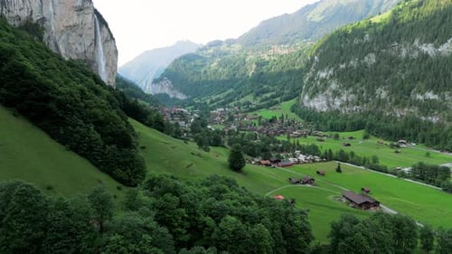 Flying to the village of Lauterbrunnen in Grindelwald Switzerland along the waterfall Spissbachfall