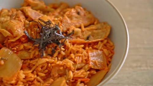 Kimchi Fried Rice with Seaweed Garnish in Bowl