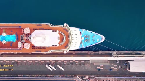 Luxury cruise ship docked at the harbor, premium travel experiences