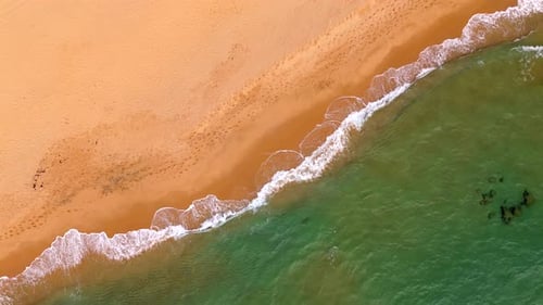 The Beach Displays a Serene Landscape with Golden Sands Calming Waves Italy