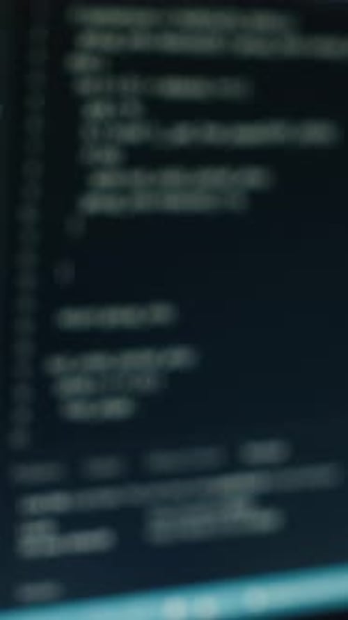 Vertical Video Extreme Close Up of Software Interface on PC Screens Showing Lines of Code