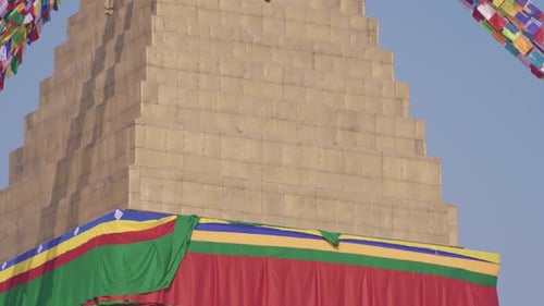 Buddha Eyes Of Boudhanath Stupa In Kathmandu Valley, Nepal.- panning up