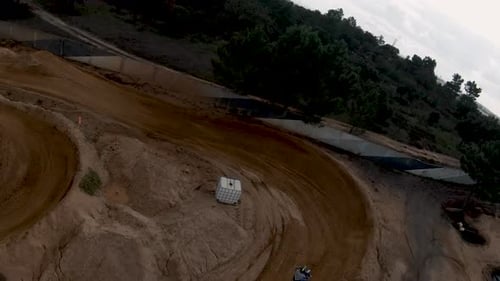 FPV drone rounds motocross dirt track banked turn