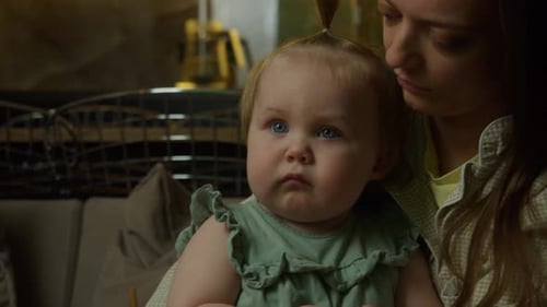 Loving Moment Between Baby and Woman