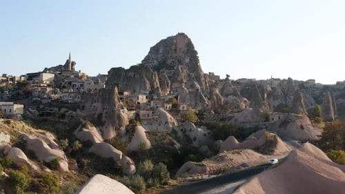 Fairy Chimneys And Historic Sivrikoya Castle In Ortahisar, Turkey. - aerial approach