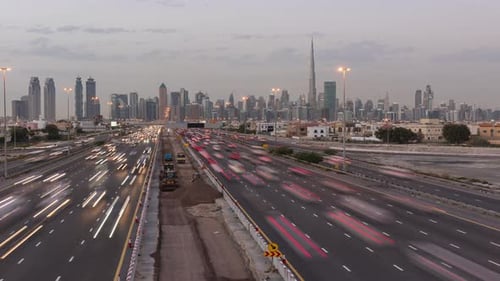 Day to Night Timelapse of Dubai Skyline Skyscrapers with Rush Hour Traffic
