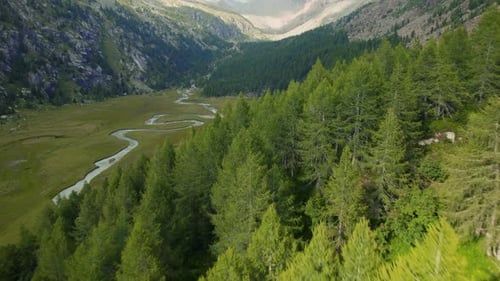 Mountain River in a Valley in the Italian Alps from a Drone