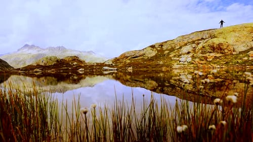 Lone Hiker Enjoys a Scenic Mountain View