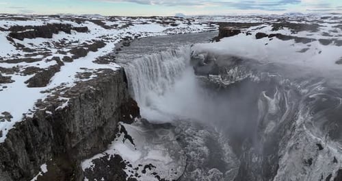 Aerial view of Dettifoss waterfall in rugged canyon, Iceland.