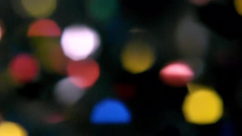 Collider Collection: Multicolored textured confetti effect with glimmering bokeh