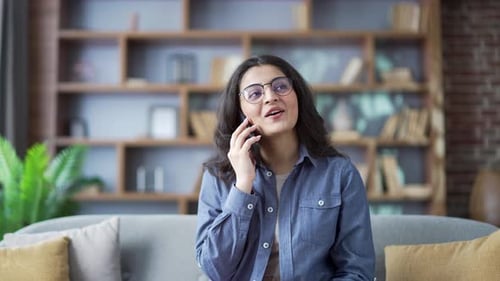 Cheerful Woman On Phone At Home