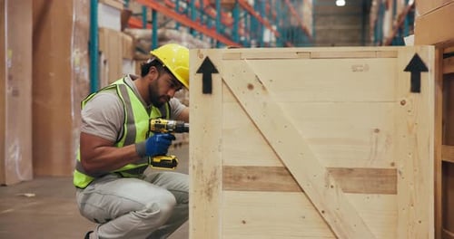 Drill, freight and box assembly with man in warehouse for logistics, packaging technician