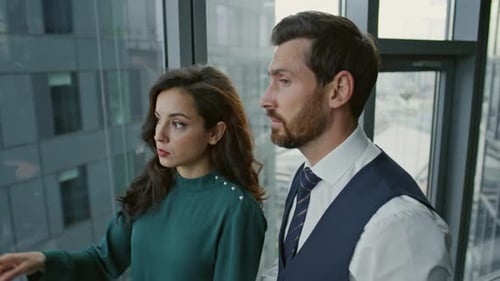 Business Colleagues Talking About Company Issues in Modern Office Close Up. Confident