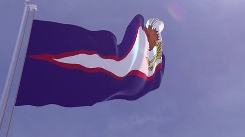 American Samoa Flag Waving Against Blue Sky