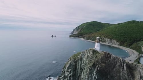 Aerial View of an Old Lighthouse on the Cliff on Pacific Coast Beautiful Panoramic Seascape