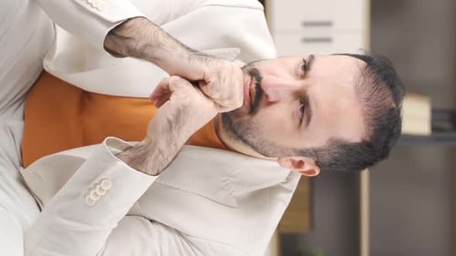 Vertical video of Frustrated man.