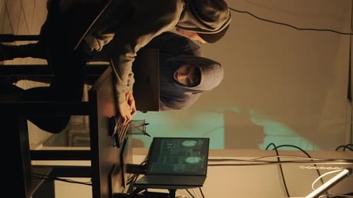 Young Adult Typing on Keyboard in an Urban Workspace