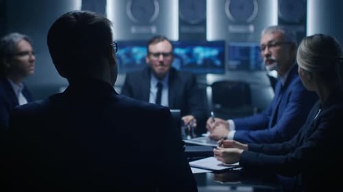 Business people in meeting room discussing global strategy