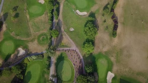 Top view on the golf course with green lawn and lots of trees, 4k