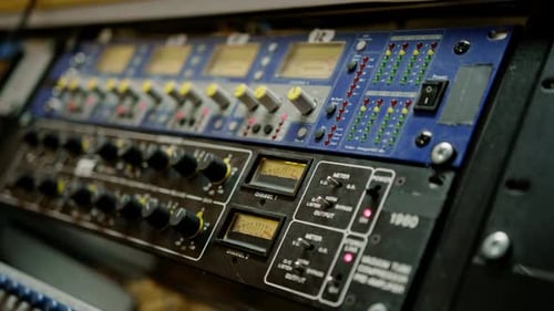old displays of professional analog volume meters in a recording studio measuring and showing