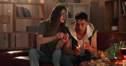Heroin, injection and people with lighter in home for substance abuse, overdose or needle opoids