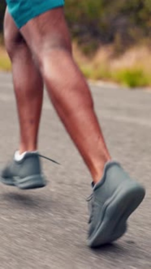Man Running On Rural Road for Health and Fitness